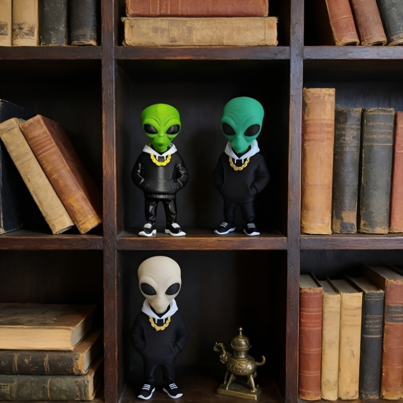 1 figurine d'alien verte avec  - Home Office Bookshelves avis et prix