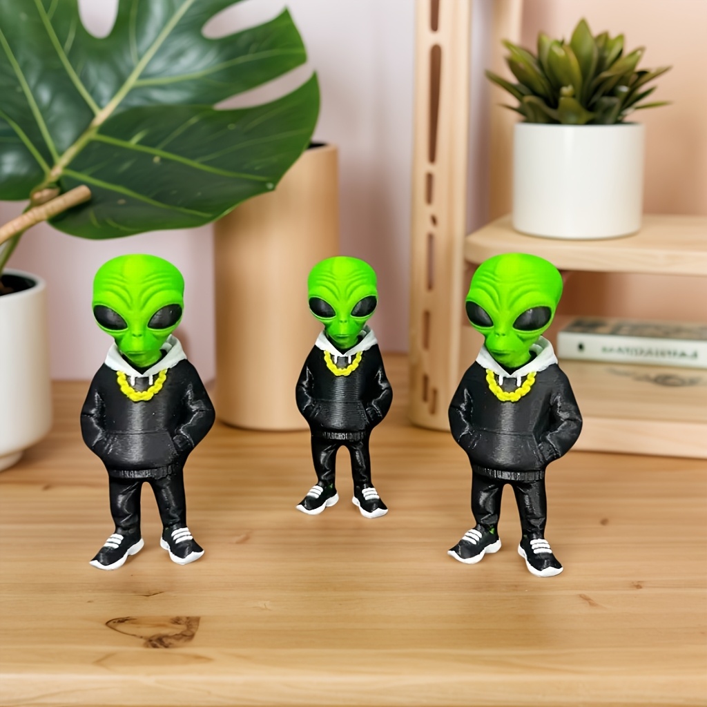 1 figurine d'alien verte avec  - Home Office Bookshelves avis et prix